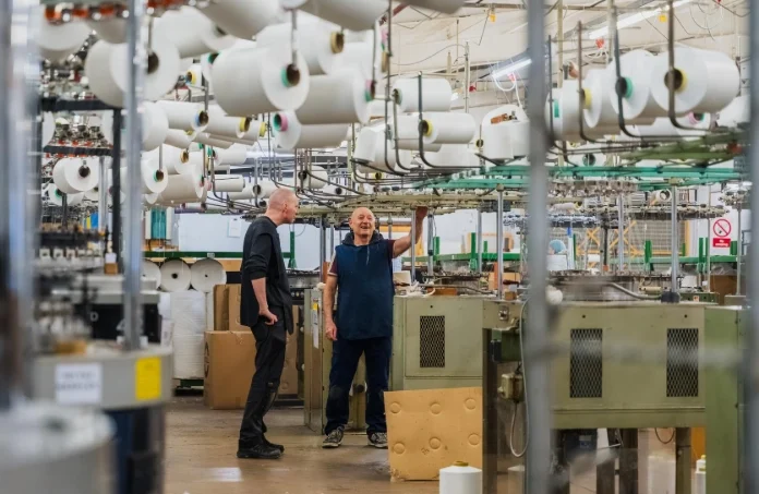 Appletex team working on the factory production floor